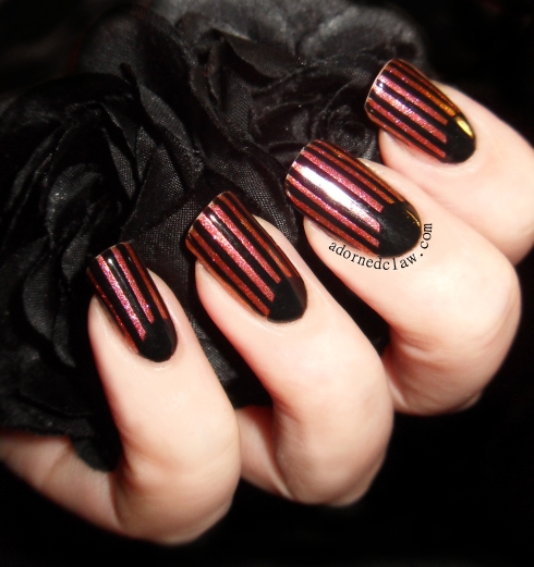black and glittery half moon nails